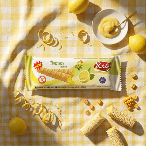 Puffy corn fingers filled with Lemon flavour cream (83%), 18 g