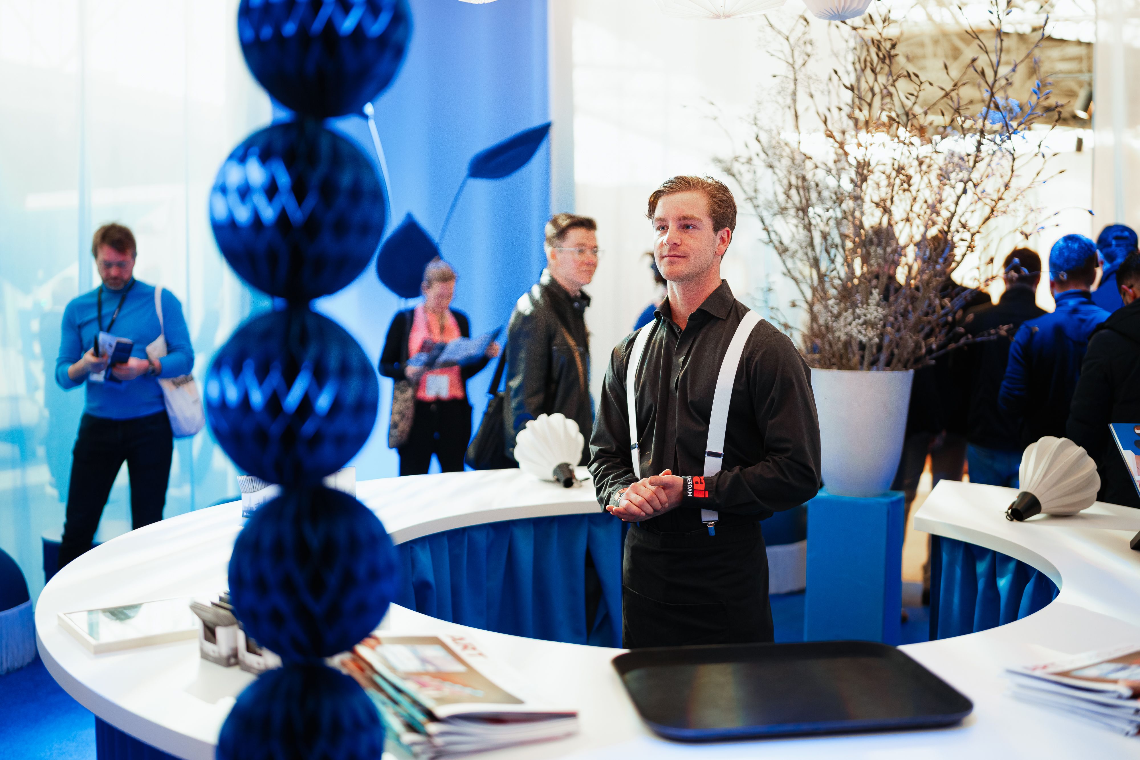 Man standing in IH Amsterdam lobby