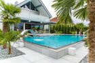 Stainless steel pool with overflow gutter
