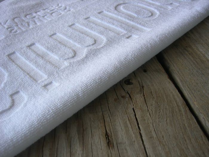 Custom towels woven with your hotel Logo