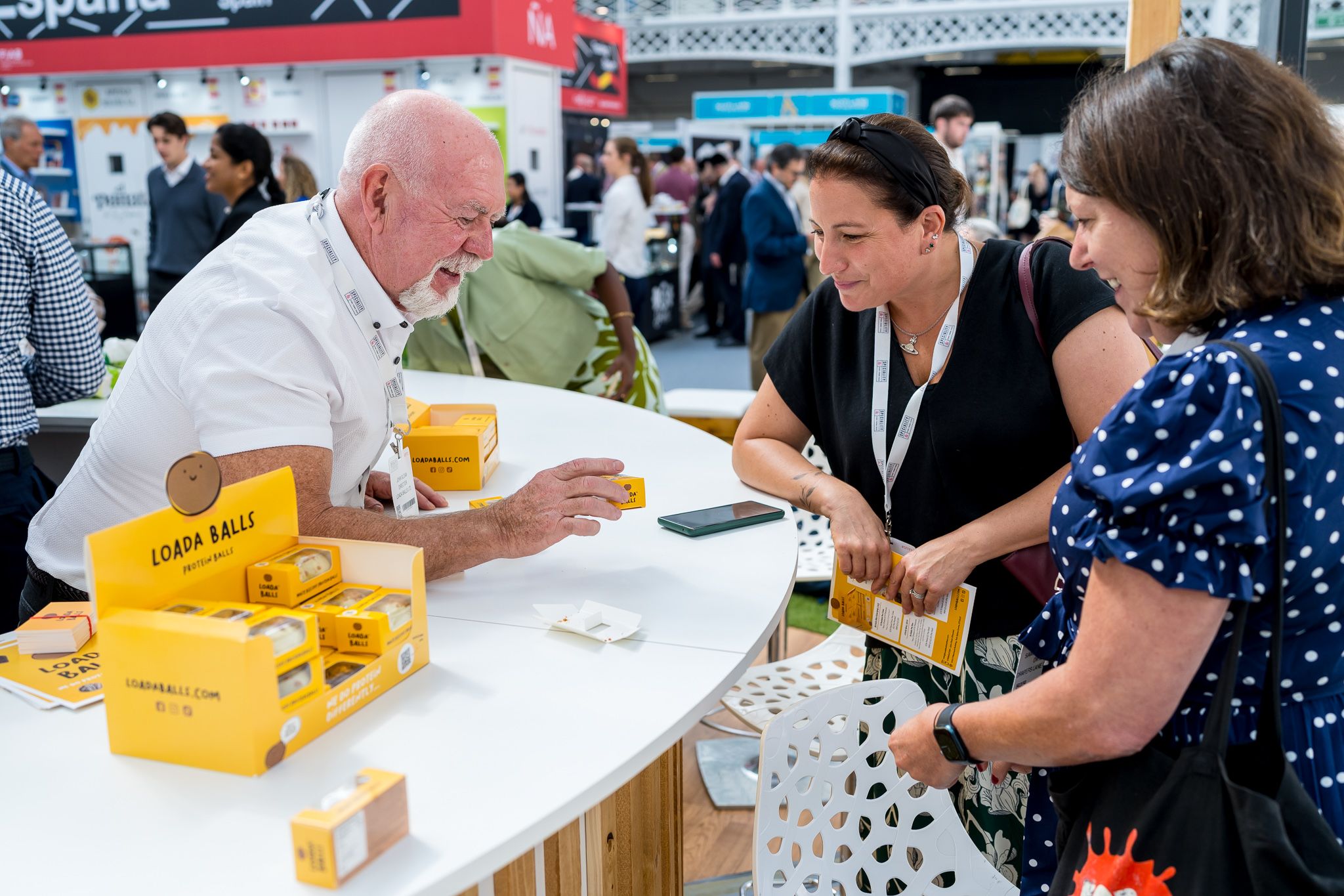 man and lady talking over counter