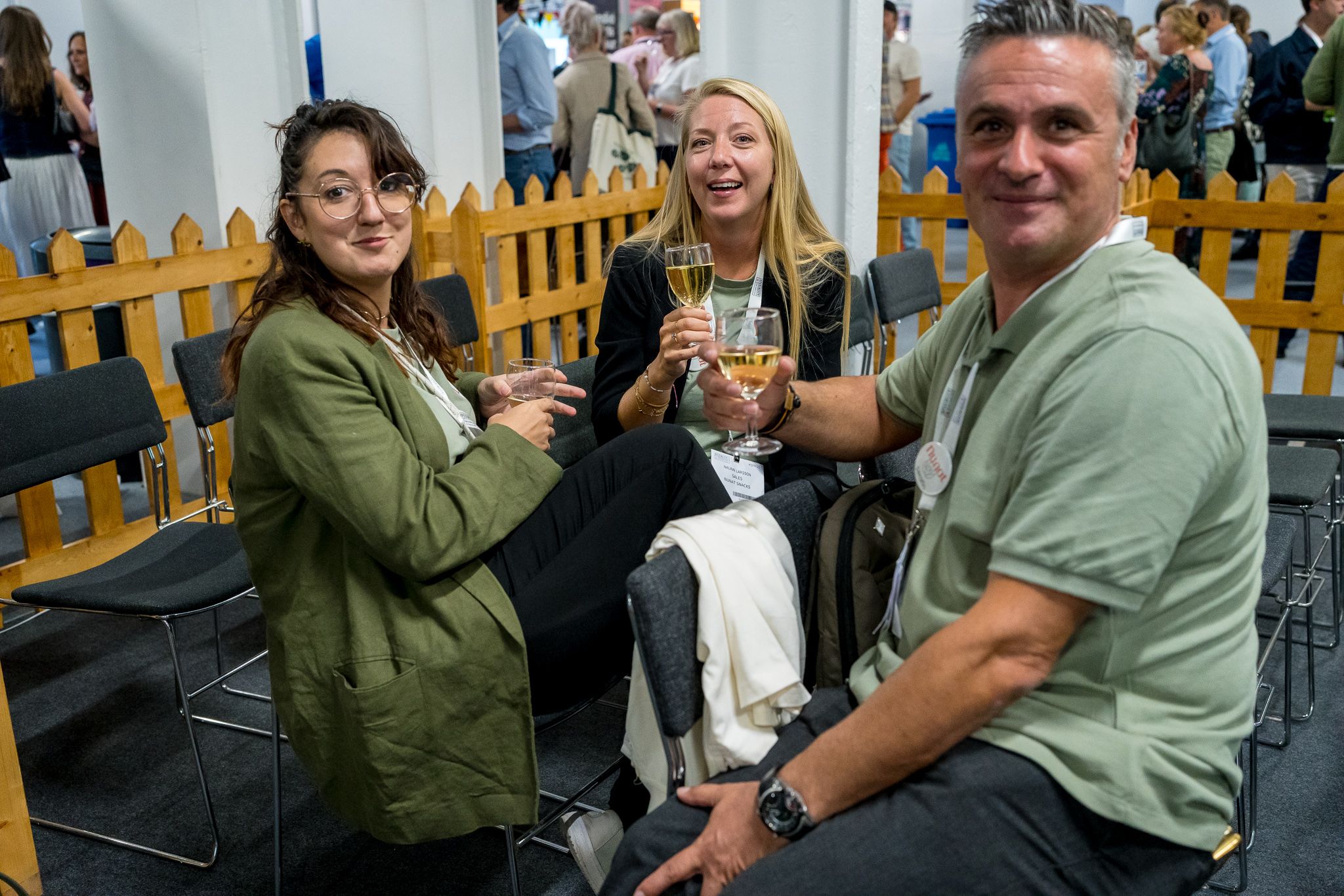 man and two woman laughing