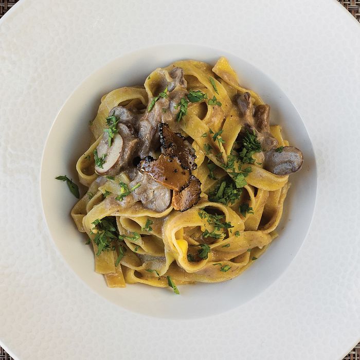 Mushroom and truffle creamy sauce egg fettuccine Pasta
