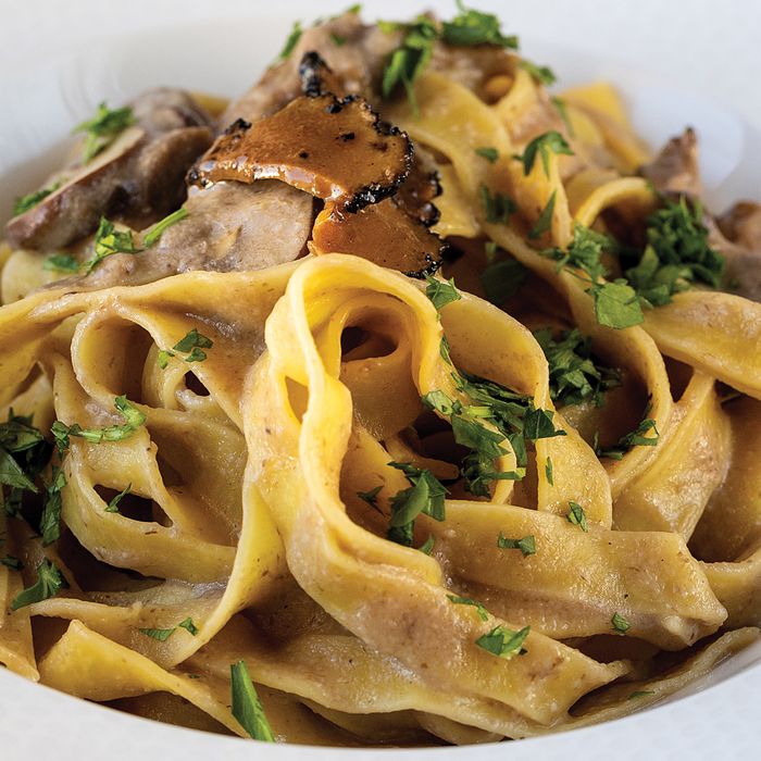 Mushroom and truffle creamy sauce egg fettuccine Pasta