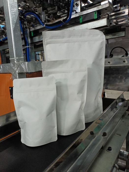 Automatic Weighing and Zipper Pouch Packing Machine (4 STATION)