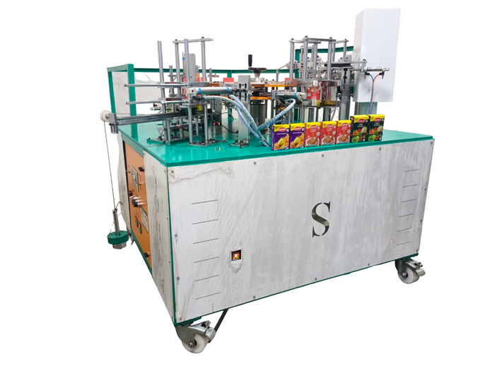 AUTO CARTOONING MACHINE WITH GLUING ATTACHMENT
