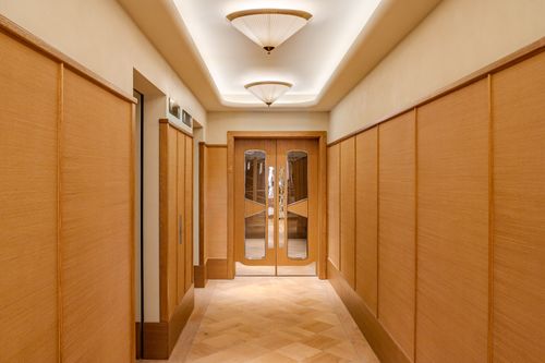 Grasscloth Installation Hotel Corridor