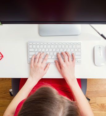 Hands performing keyboard search