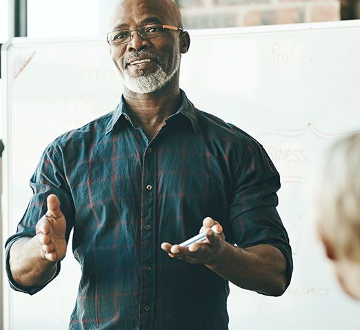 Professional African American Man Explaining CPE Information