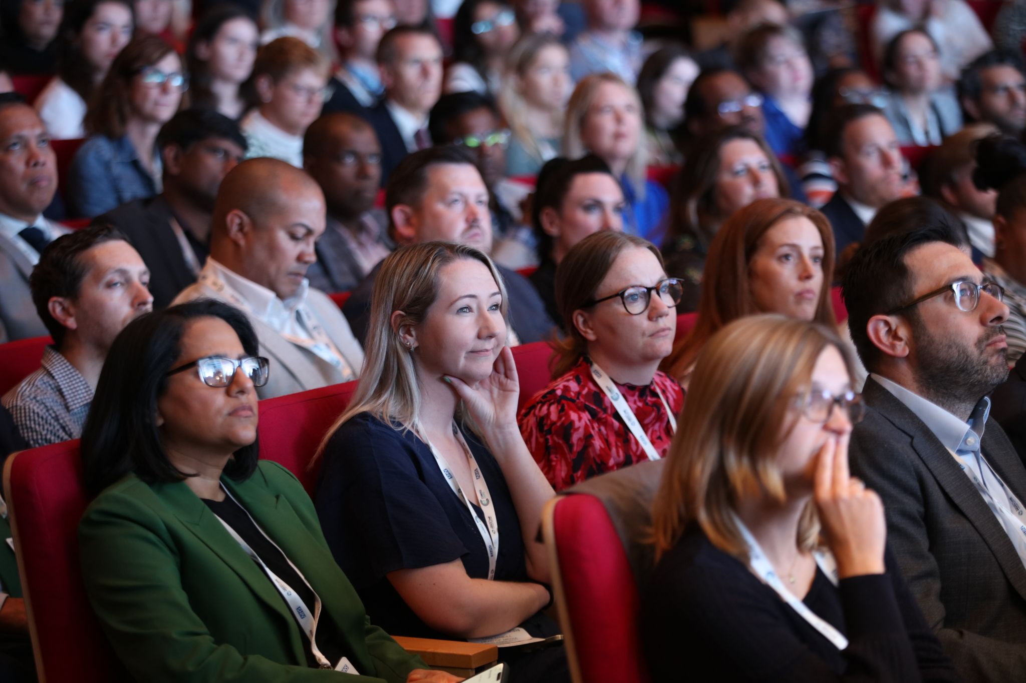 Delegates sat watching speakers on the main stage