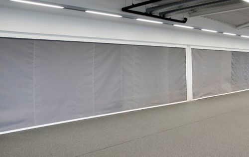 WHY DOES A BUILDING NEED FIRE CURTAINS?