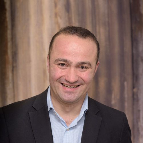 Speaker profile image for Adrian Rusu