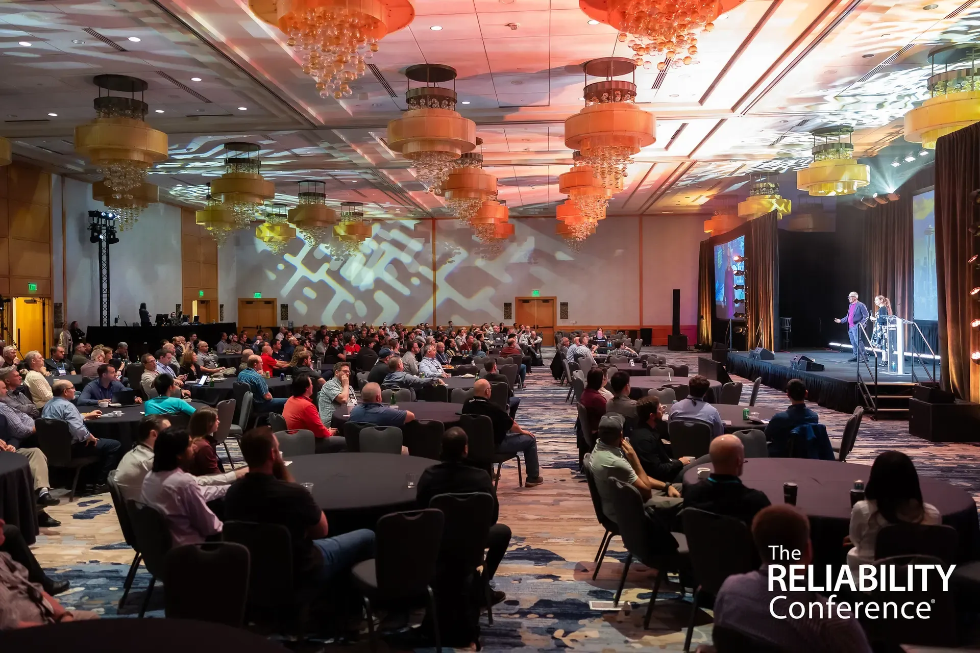 Attendees networking at The RELIABILITY Conference
