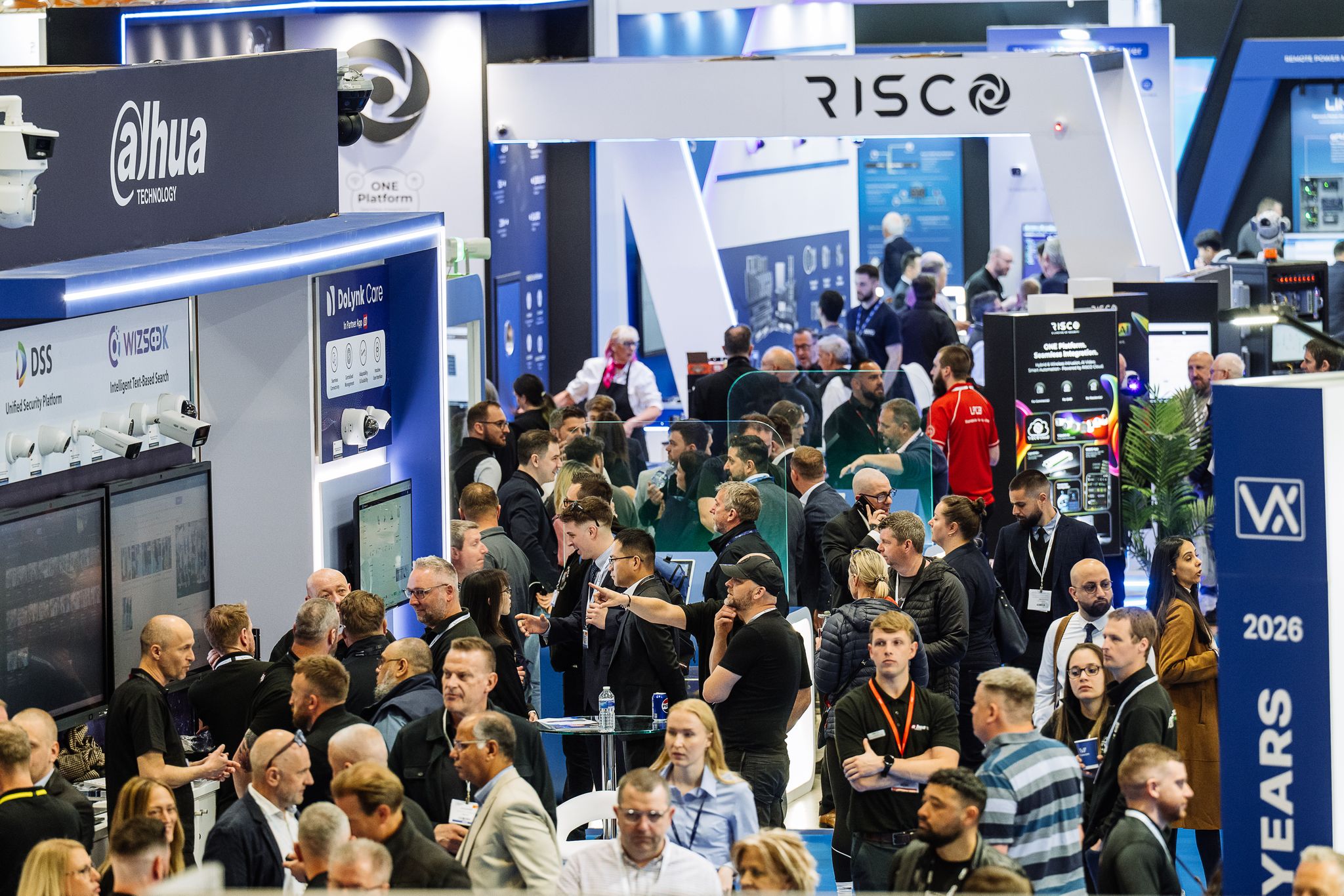 Image of Security Event attendees at the entrance. 