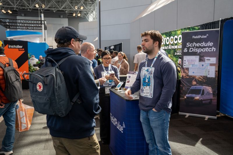 two people networking at installershow new york