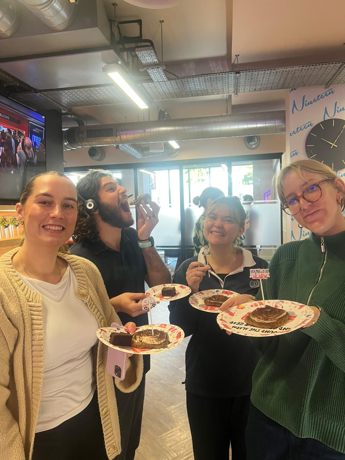 Sales and Marketing Team Enjoying Cake