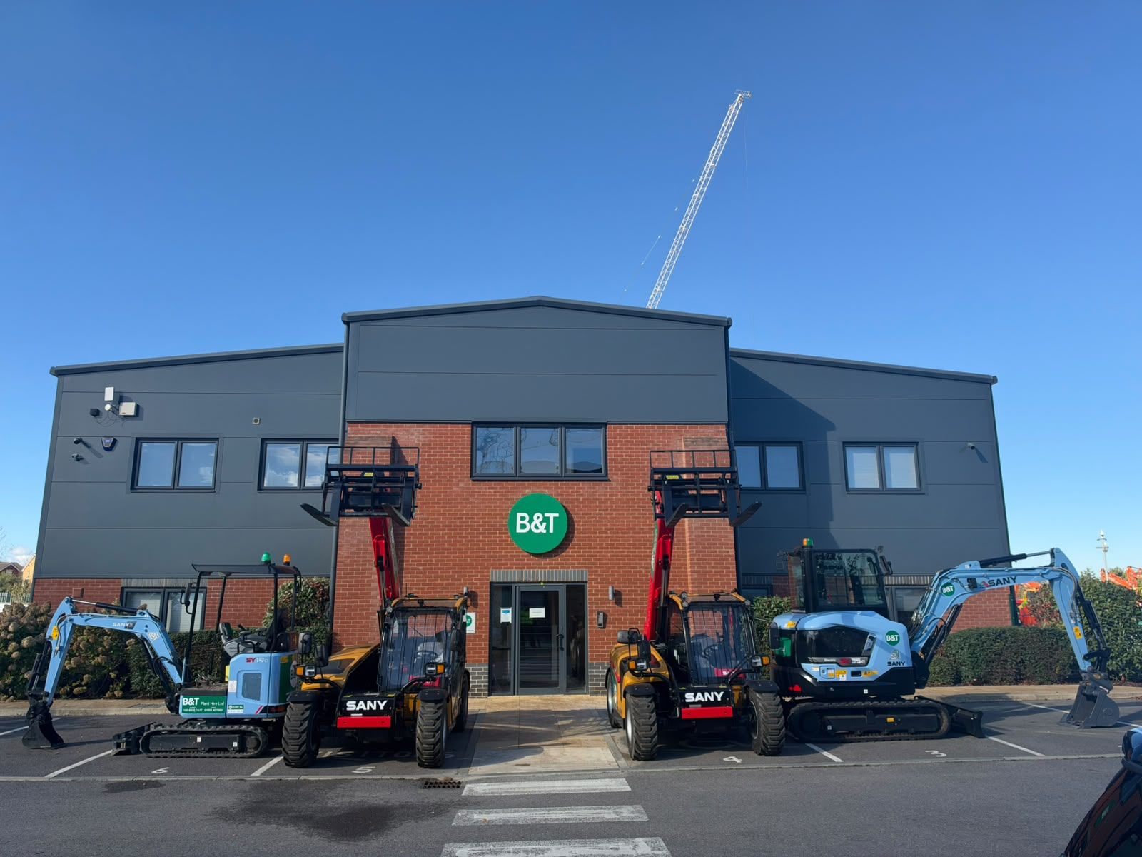 A selection of the all-electric SANY machines outside B&T Plant HQ.