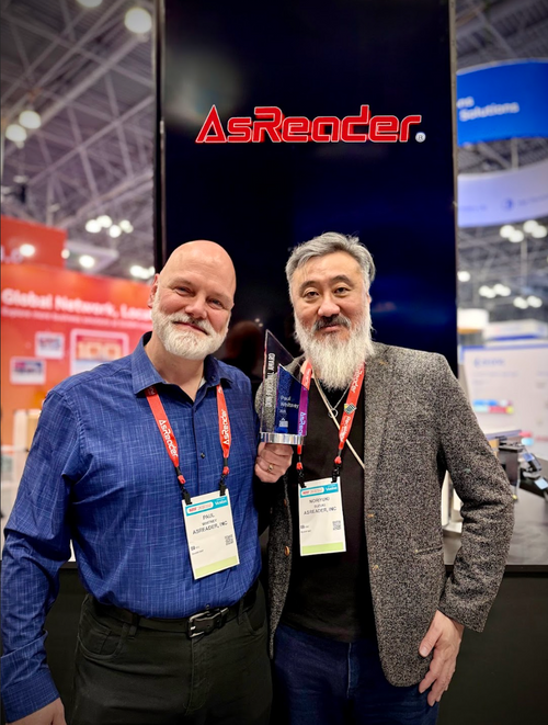  Paul A. Whitney of AsReader, Inc., wins the Don Percival award from AIM Global