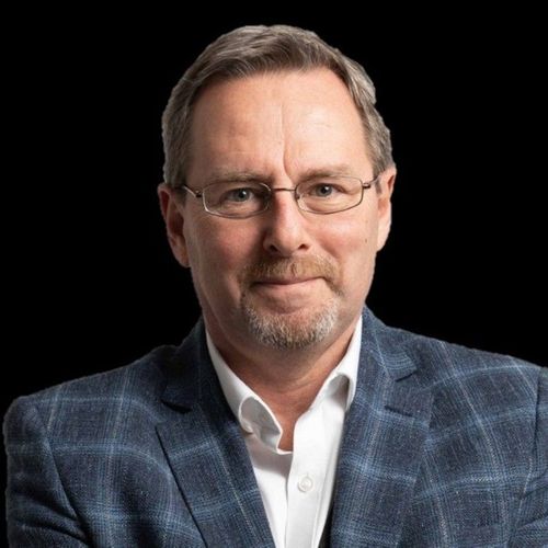 Speaker profile image for Andrew Busby