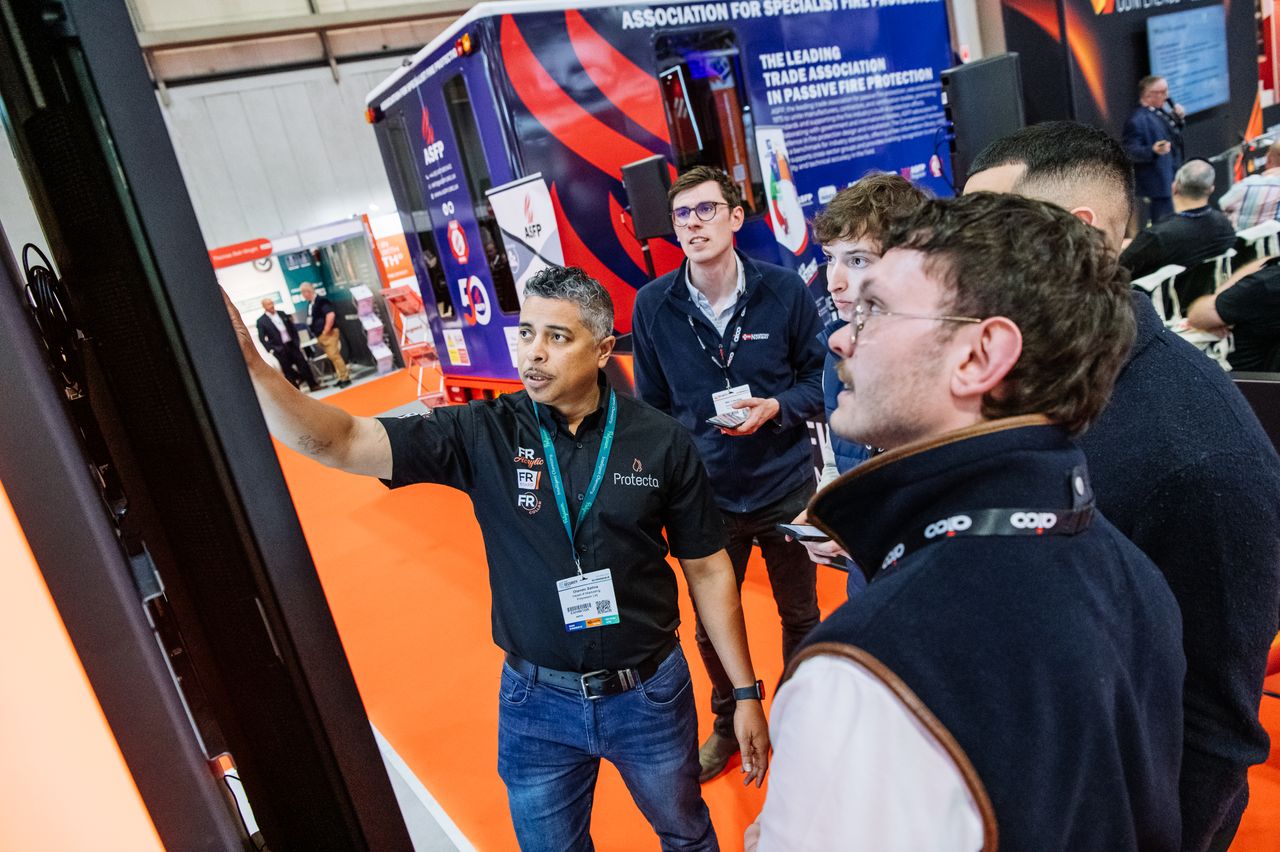 The Fire Safety Event Asia visitors looking at a screen