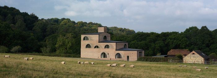 Adam Richards builds his own home, Nithurst Farm, in Sussex with arched brick windows