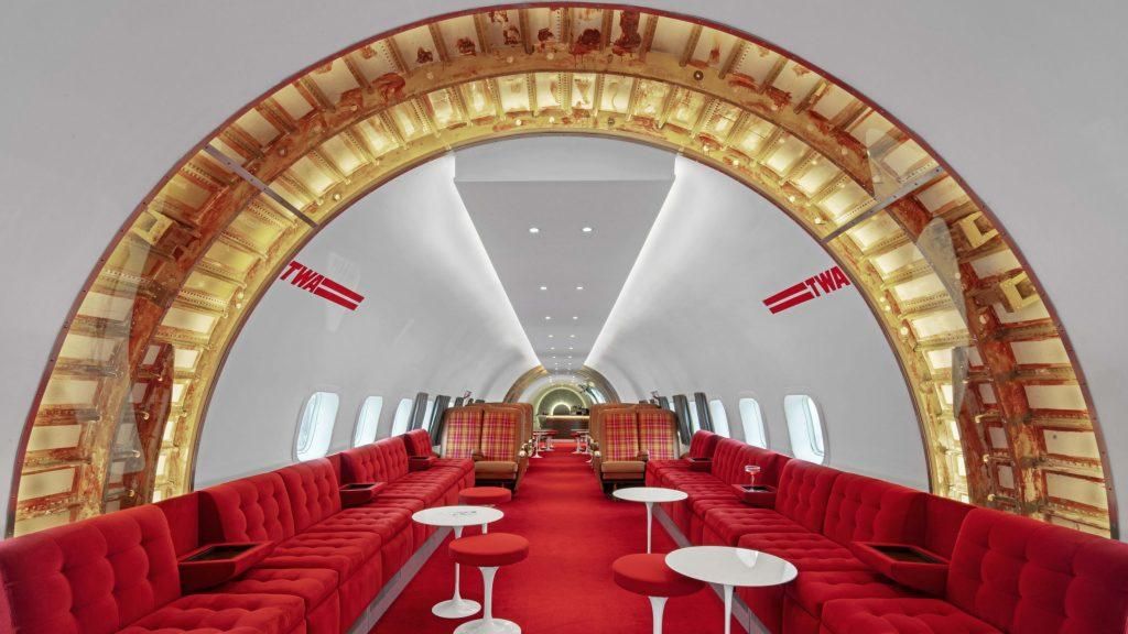 Stonehill Taylor designs retro Connie bar inside a plane at JFK's TWA Hotel