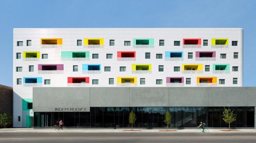 Check out John Ronan Architects colorful library and modern affordable housing project in Irving Park.