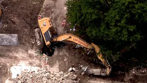 Person ‘extricated' after being trapped inside fallen crane during demolition of Oak Forest Hospital