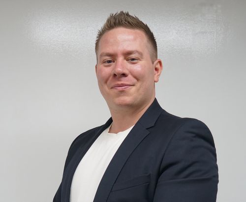 Speaker profile image for Alasdair Mealey