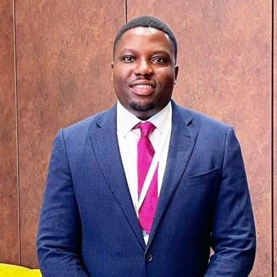 Speaker image for Amos Simbo OBE