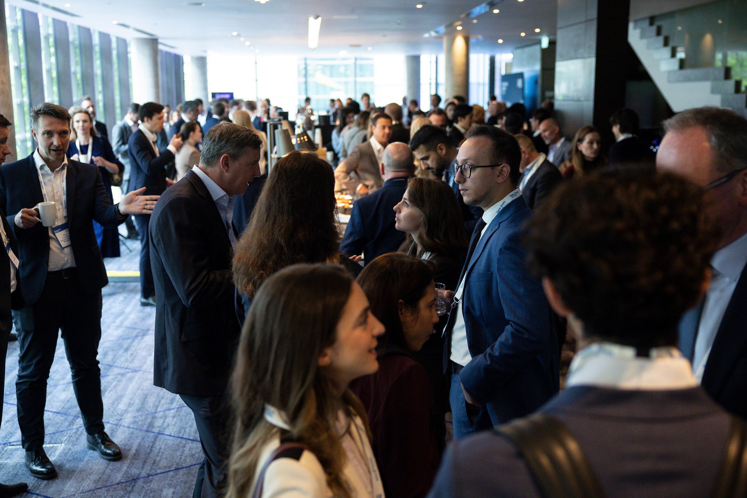 Private debt investors networking during coffee break at PDI DACH Forum Munich