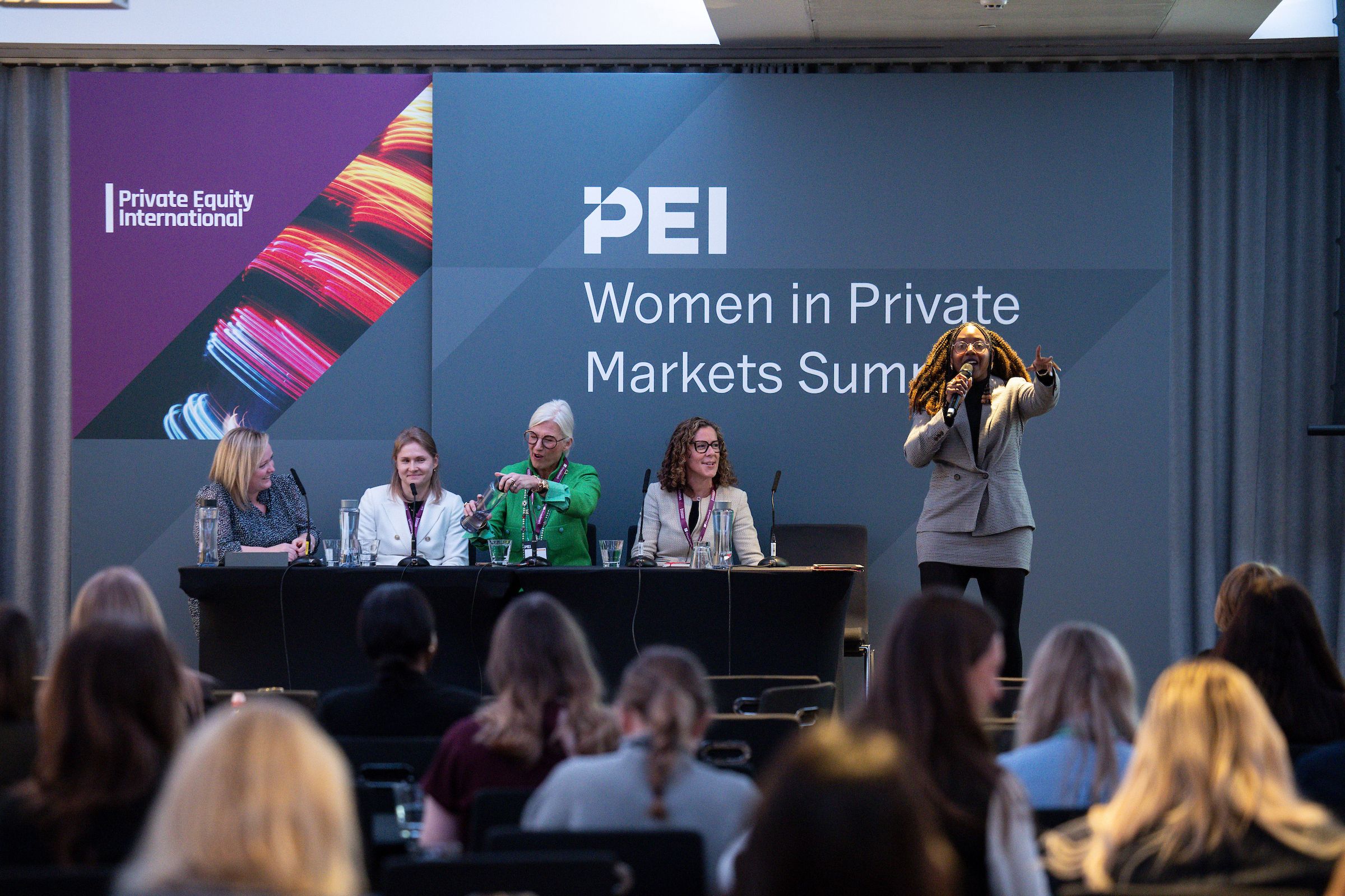 Attendees networking at the Women in Private Markets Summit