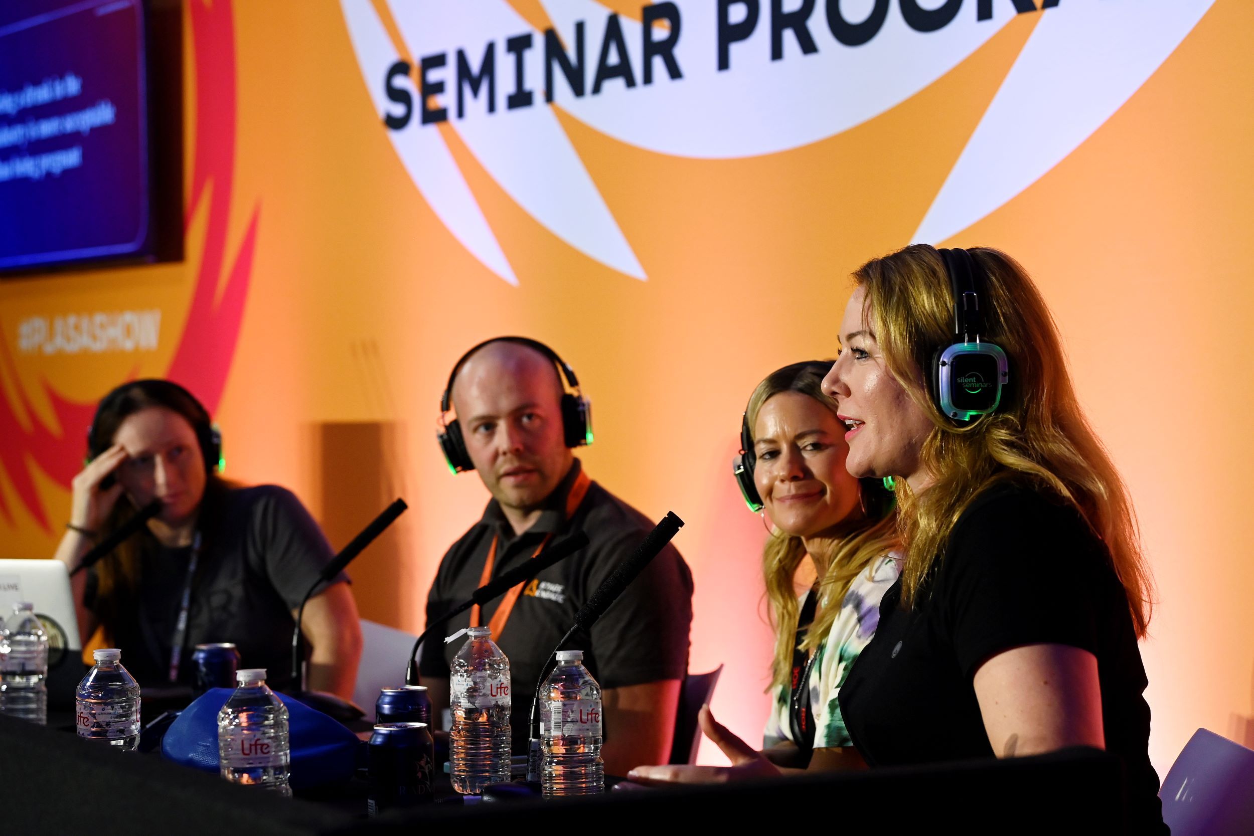 3 women and 1 man speaking on panel session at plasa show