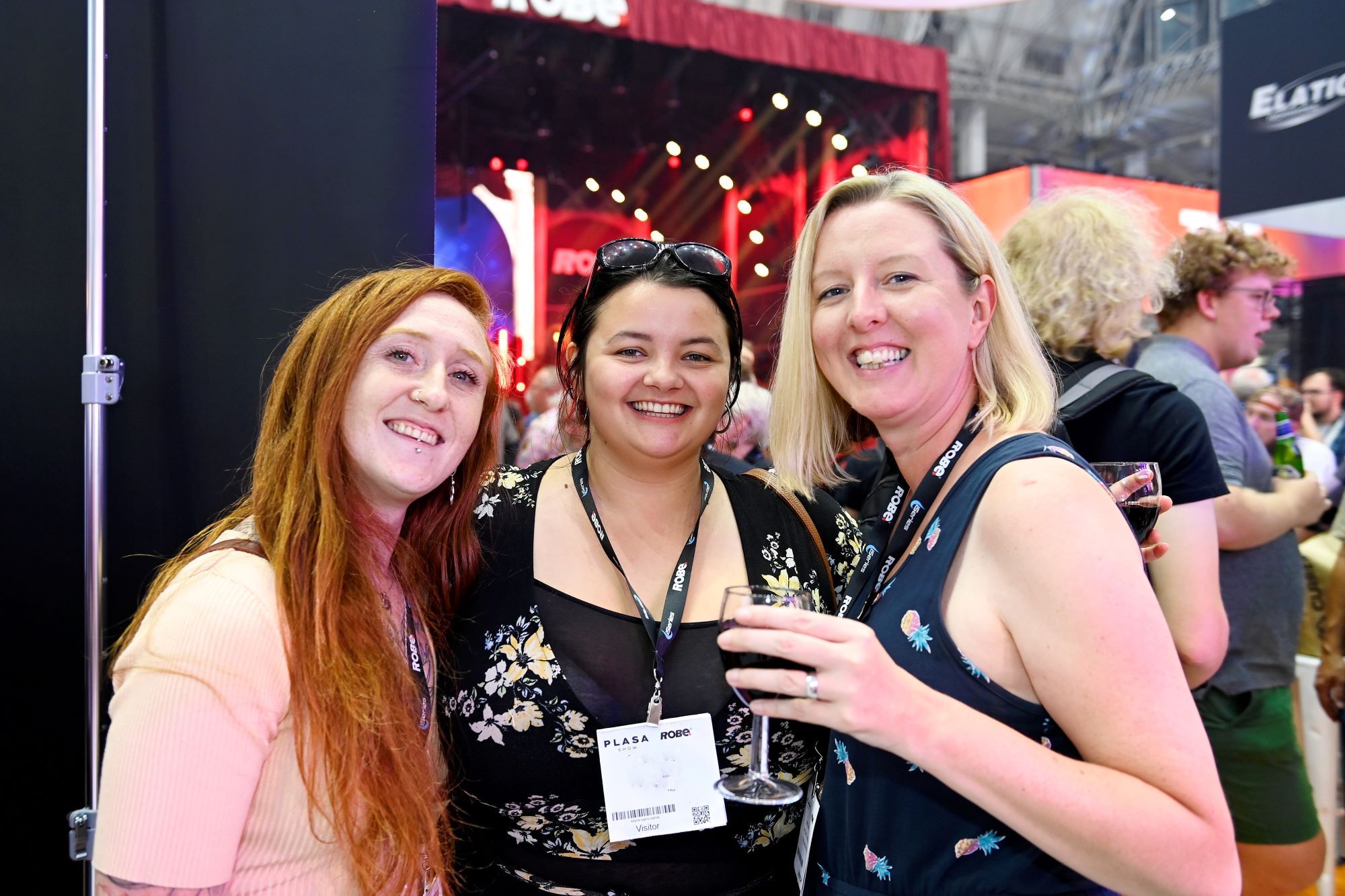 3 women posing for a photo at plasa show after party