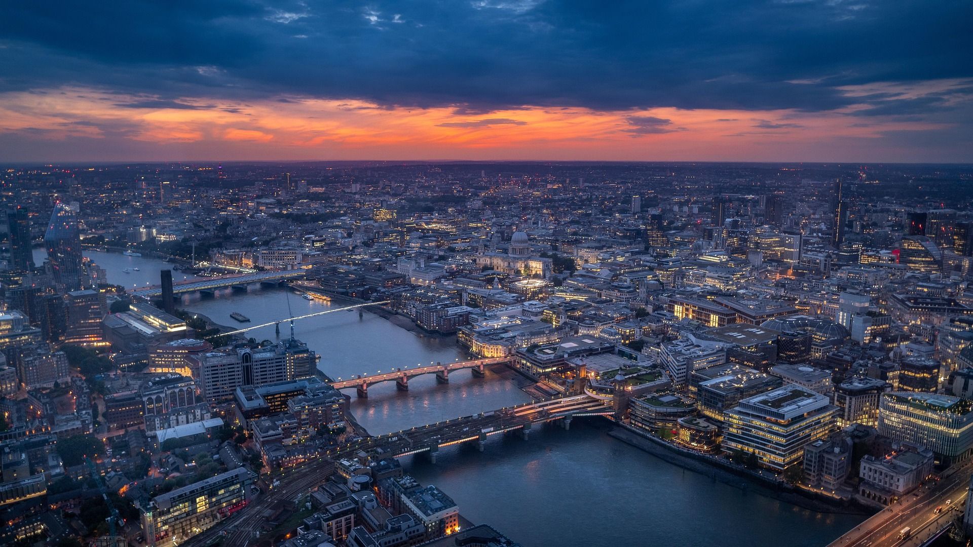 London skyline at dusk with a orange sunset
