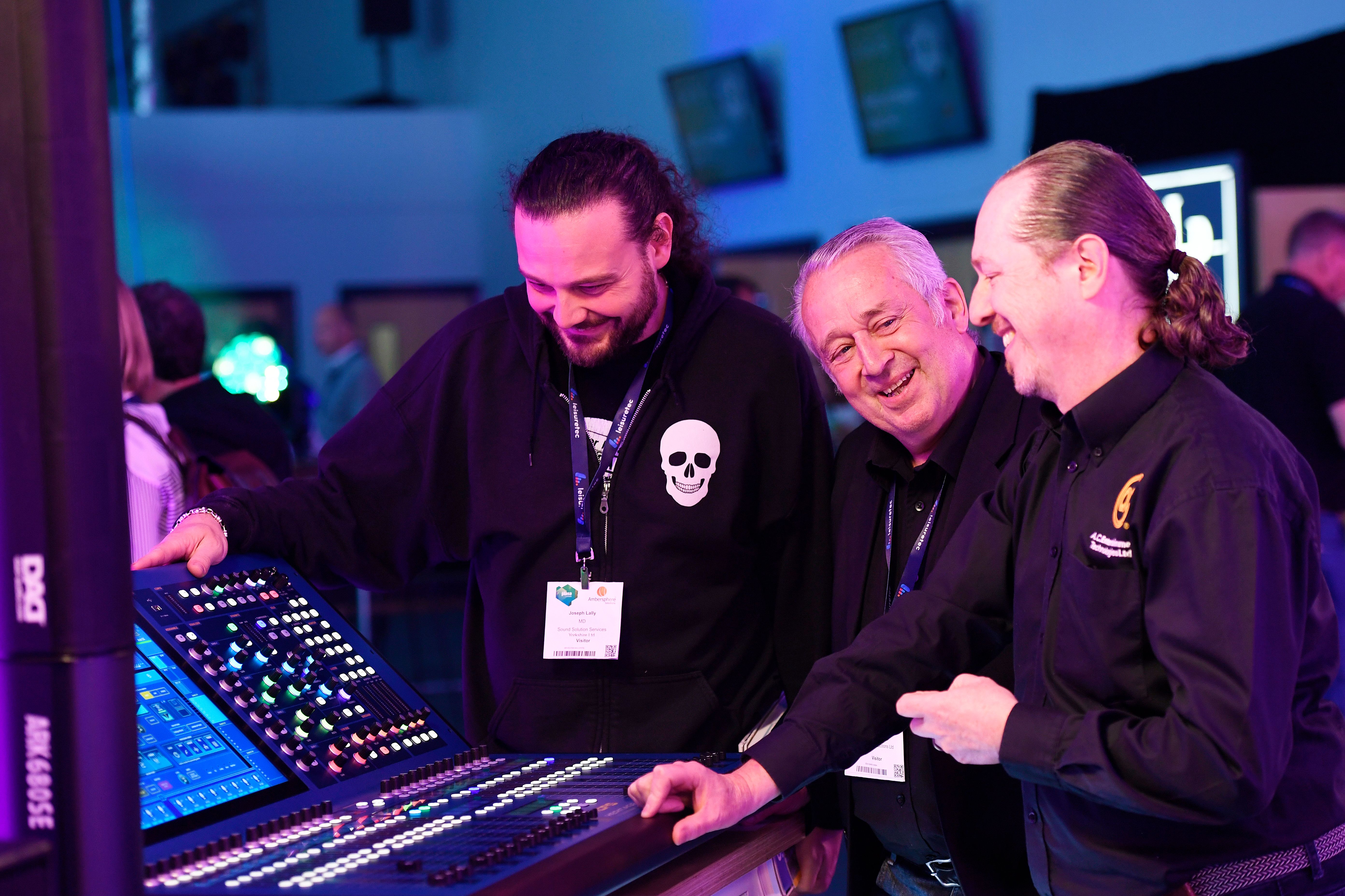 A.C Entertainment Technologies demonstrating a pro sound desk to customers