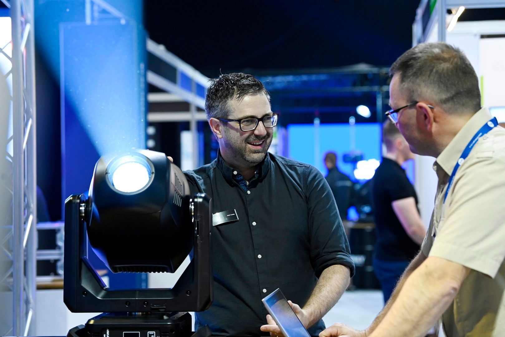 ETC exhibitor smiling at visitor plasa focus leeds 2024