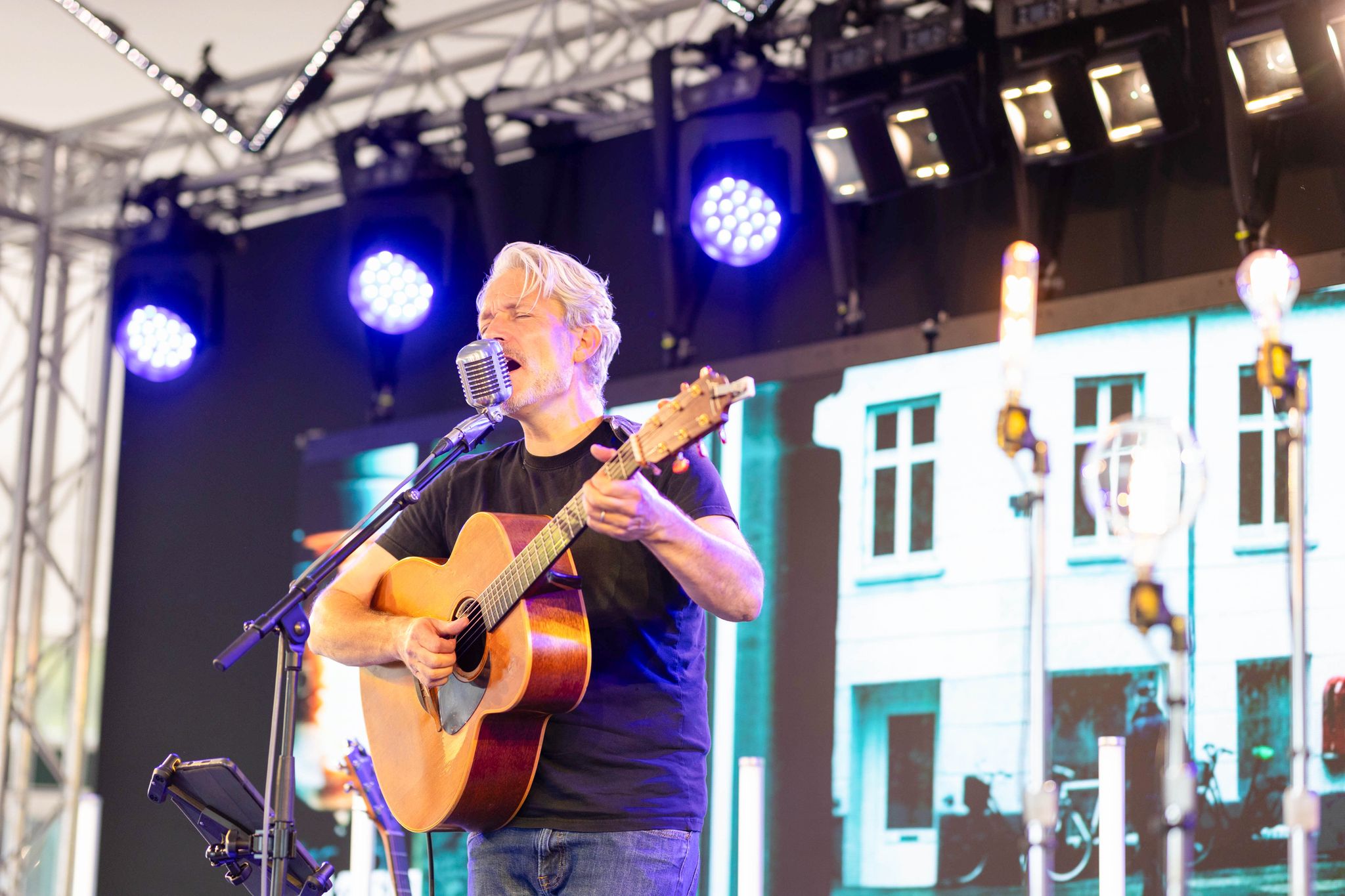 man with guitar singing
