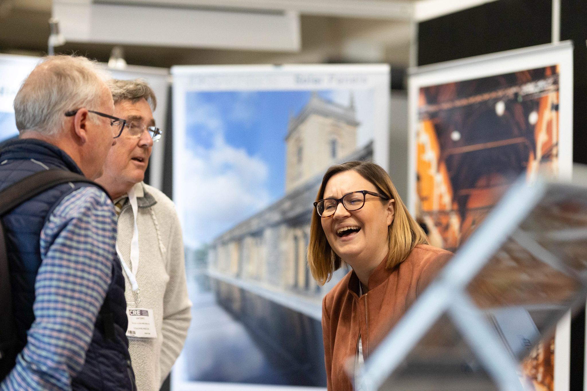 Exhibitors laughing