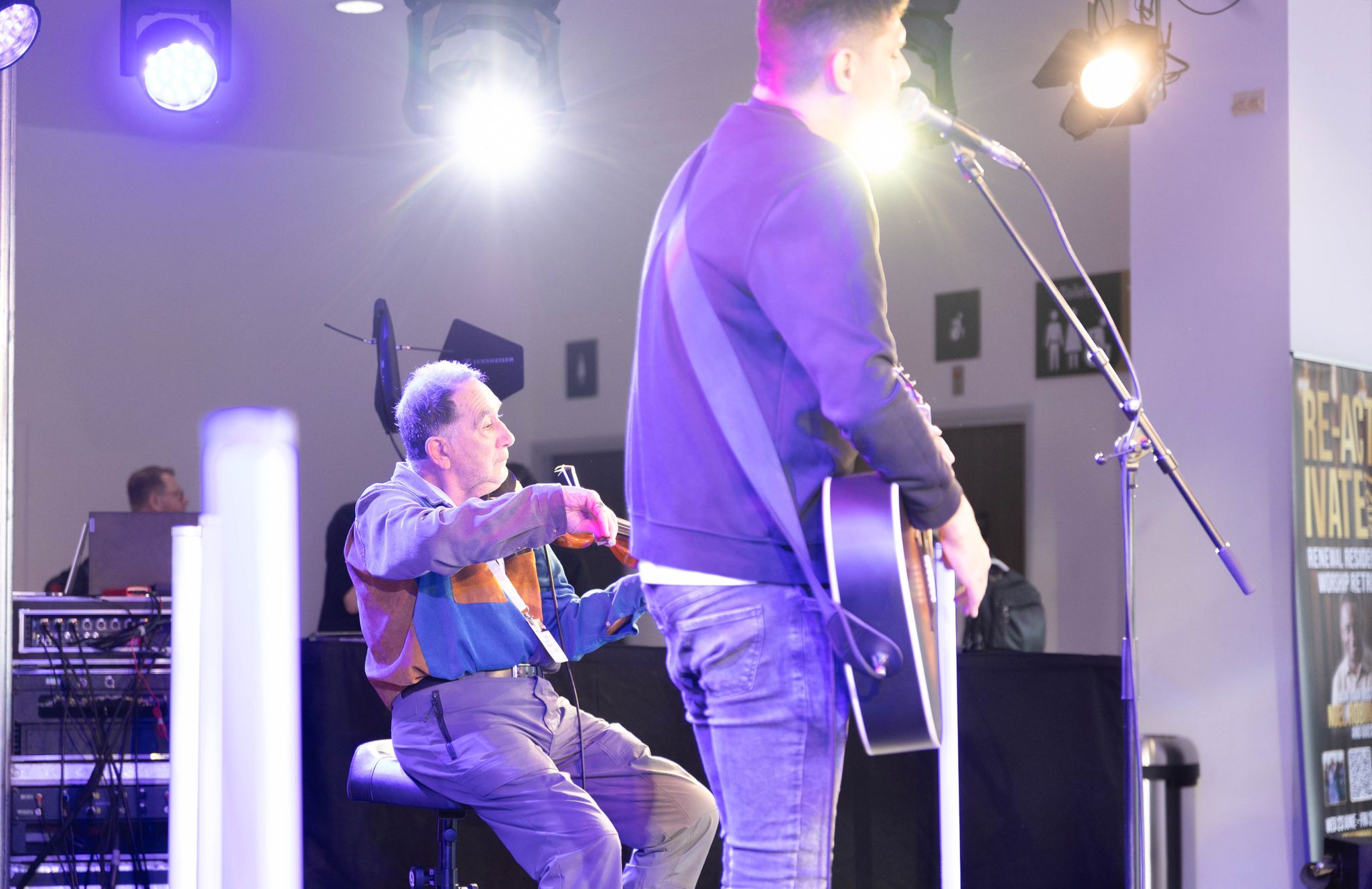 Musicians playing their instruments on stage