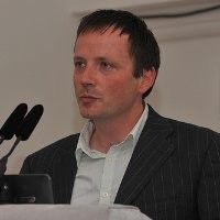 Speaker profile image for Alasdair Mangham