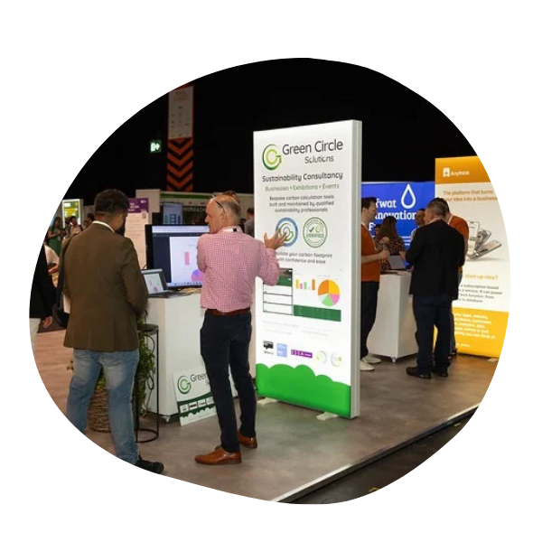 Interaction between company representatives and clients at an Exhibition Pod at Reset Connect London