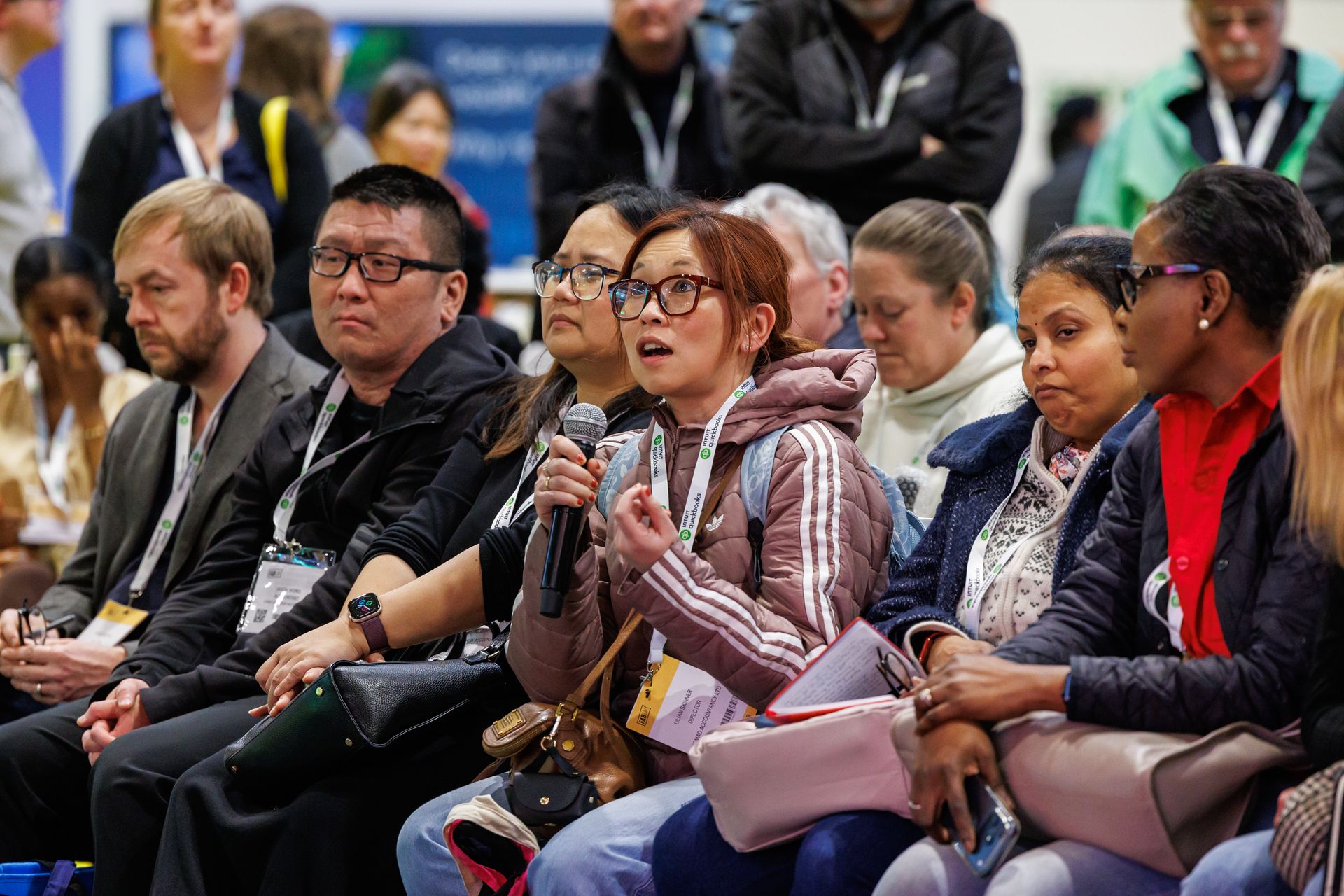 Audience member asking a question at FAB 2026
