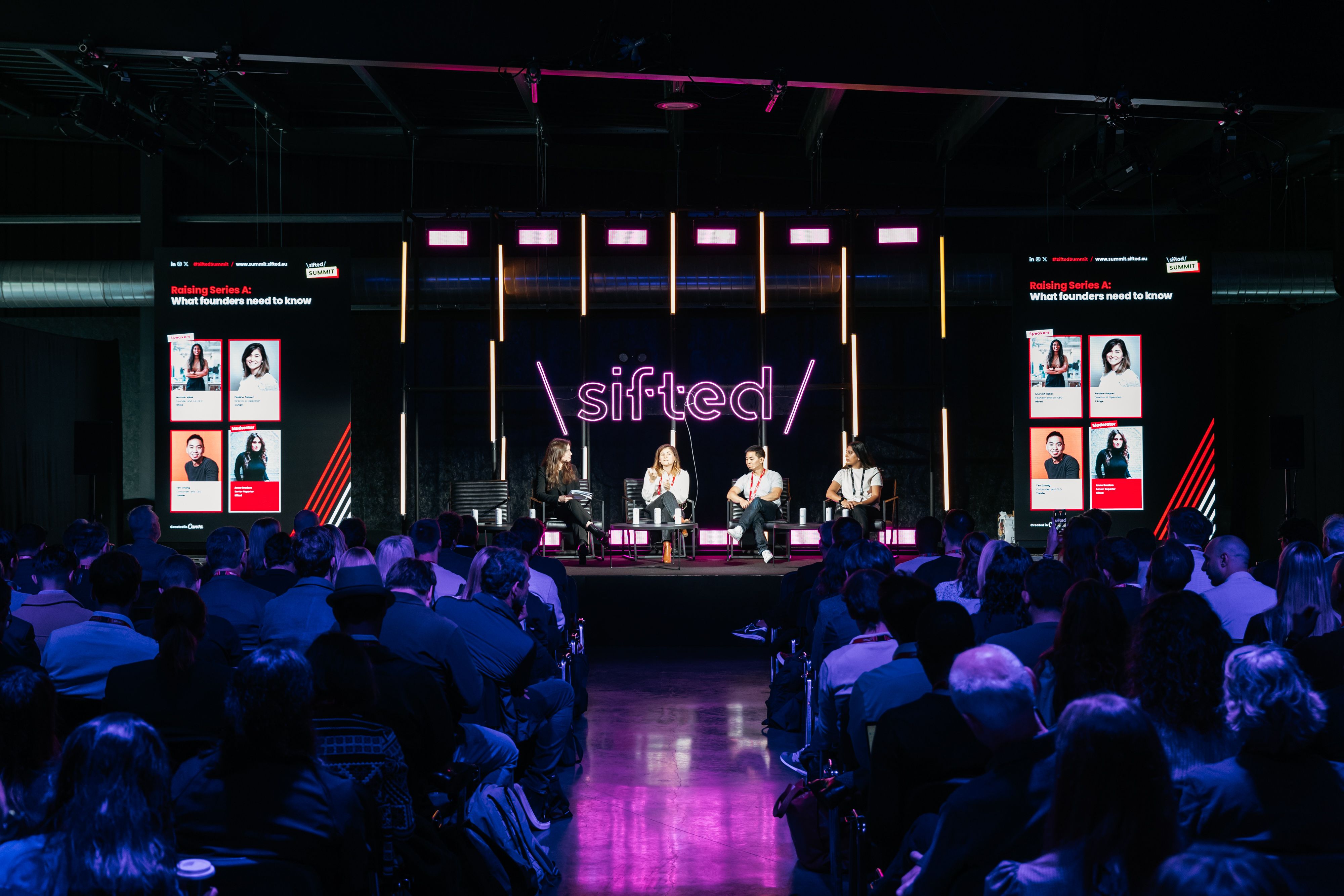 a busy stage and crowd at sifted summit