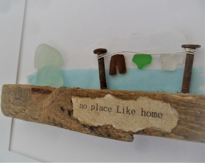 Uplifting hand crafted framed sea glass artwork