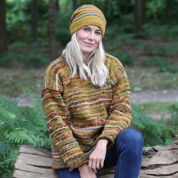 24/25 season unisex 'Wot Knot' jumper in gold worn with gold heather altitude bobble had