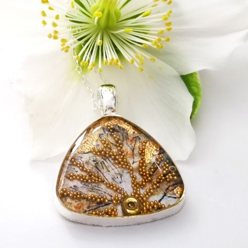 Triangular pendant