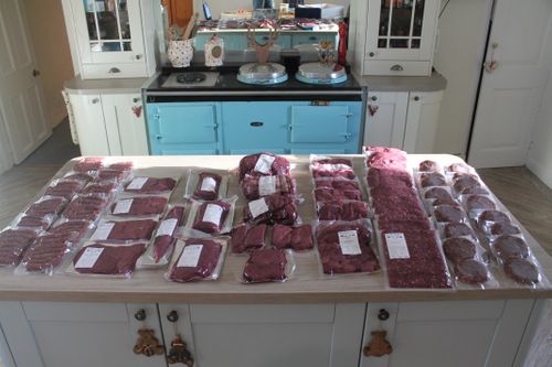 Whole deer, butchered into different cuts; packed & labelled