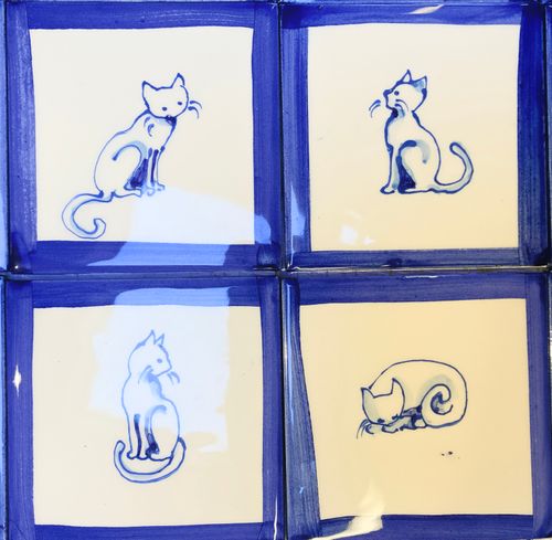 Hand painted delft style cats