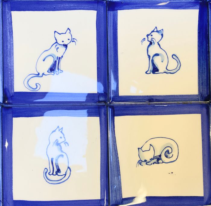 Hand painted delft style cats